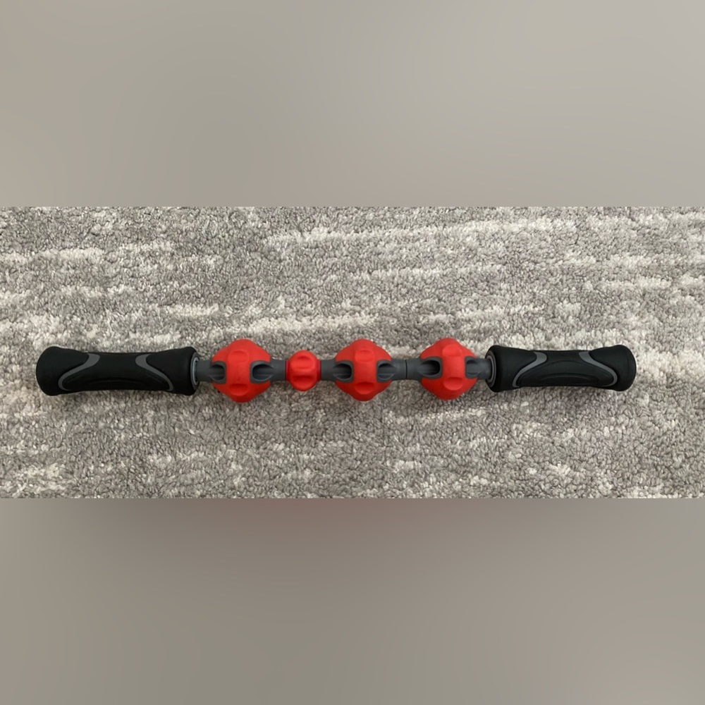 Brookstone Fitness Massage Stick muscle recovery roller with 4 rotating beads